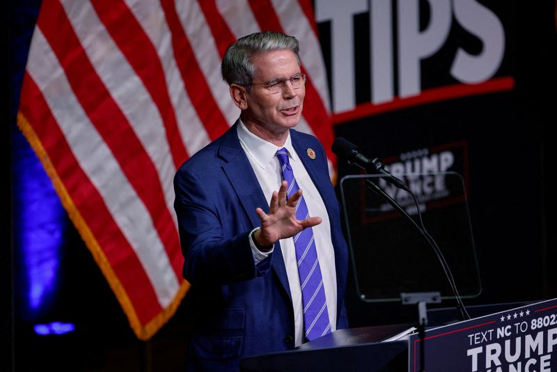 © Reuters. FILE PHOTO: FILE PHOTO: Key Square Group founder Scott Bessent speaks at a campaign event for Republican presidential nominee and former U.S. President Donald Trump in Asheville, North Carolina, U.S. August 14, 2024. REUTERS/Jonathan Drake/File Photo/File Photo