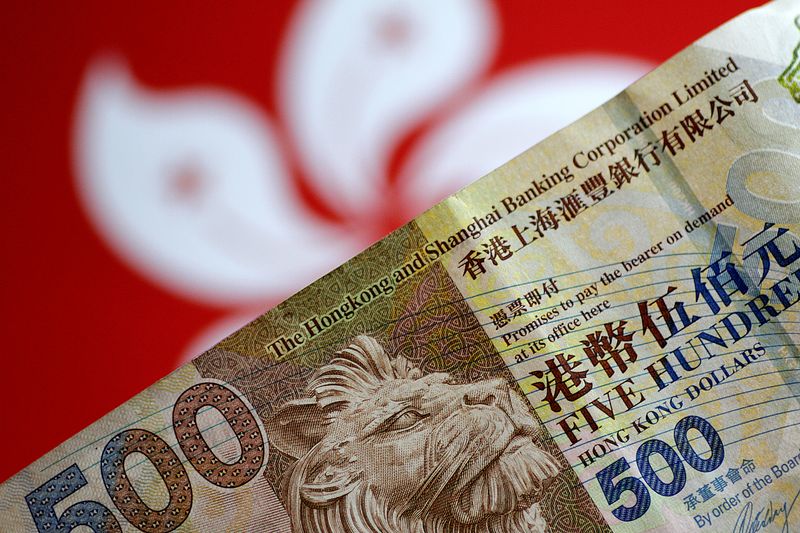 © Reuters. FILE PHOTO: A Hong Kong dollar note is seen in this illustration photo May 31, 2017. REUTERS/Thomas White/Illustration/File Photo